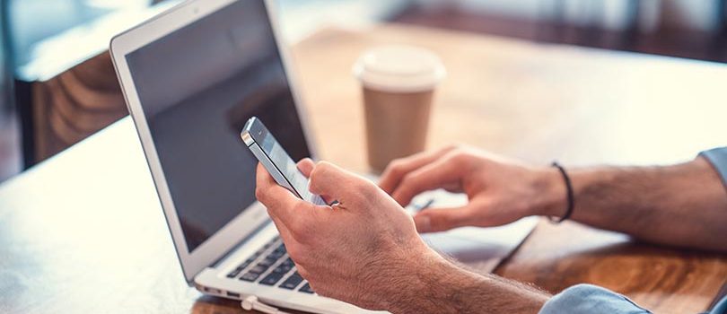 Technology Man with laptop and phone