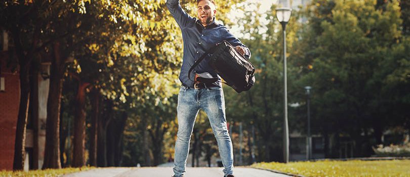 Young happy businessman jumping in air Young happy businessman jumping in air